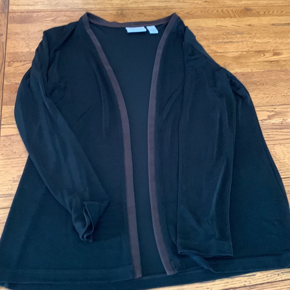 Chicos black travelers open jacket with brown trim. Excellent condition